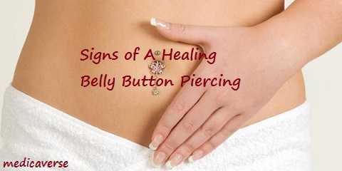 signs of a healing belly button piercing